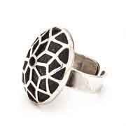 A geometric oval shaped silver ring