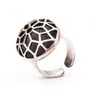 A geometric oval shaped silver ring